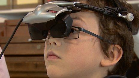 Calum Stillie wears video game goggles