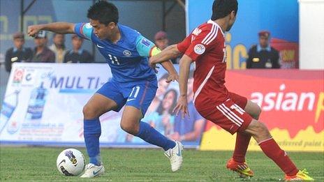 Indian attacker Sunil Chhetri (left) in action against Tajikistan in March 2012