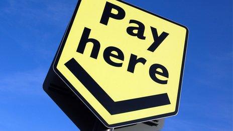 Pay here sign