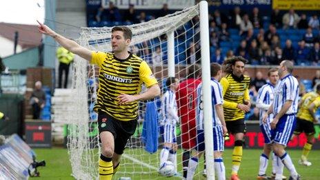 Celtic defender Charlie Mulgrew celebrates after scoring against Kilmarnock