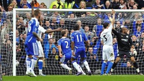 Wigan's players appeal for offside after Branislav Ivanovic puts Chelsea ahead