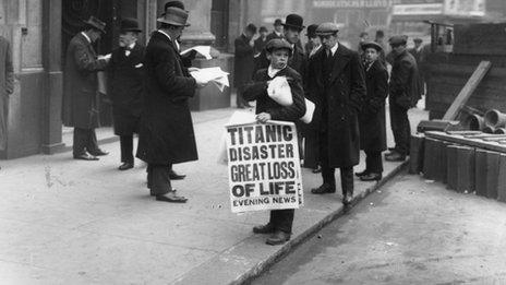 Newspaper boy outside White Star Line offices in London. c. Getty Images