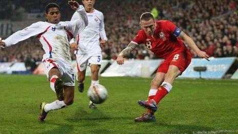 Craig Bellamy fires a shot against Costa Rica