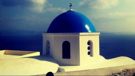 Image of a domed Greek church treated with an Instagram app