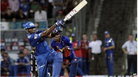 Kieron Pollard of Mumbai Indians plays a shot during the Indian Premier League (IPL) cricket match against Rajasthan Royals in Mumbai, India, Wednesday, April 11, 2012.