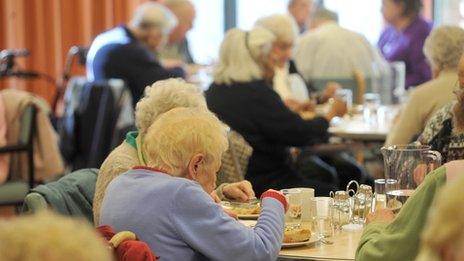 Elderly people eating