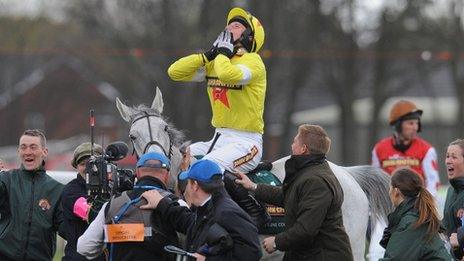 Daryl Jacob celebrates victory on Neptune Collonges