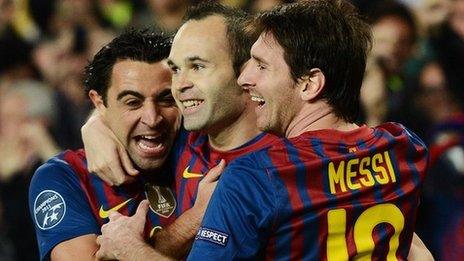 Barcelona trio Xavi, Andres Iniesta and Lionel Messi