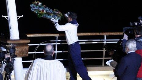 A wreath being thrown off MS Balmoral