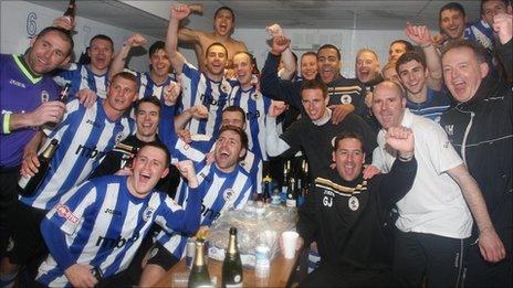 Chester's players celebrate promotion