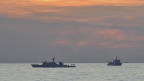 Two Chinese surveillance ships near the Scarborough Shoal on 10 April, in image via Philippine military