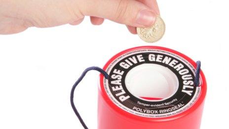 Person placing money in charity collection tin (generic)