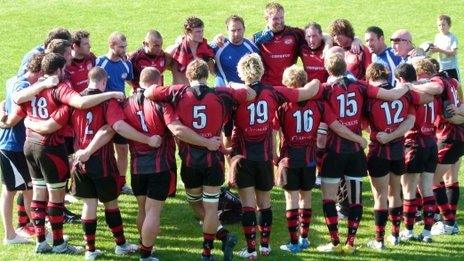 Jersey team huddle