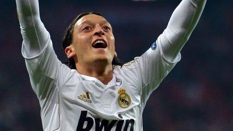 Mesut Ozil celebrates scoring for Real Madrid