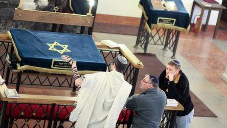 Jewish men in Nozyk Synagogue (Pic: Daniel Miernik)