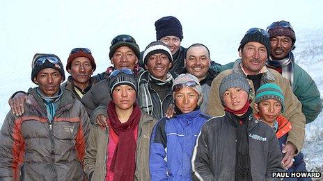 Tanzin (back) with local residents