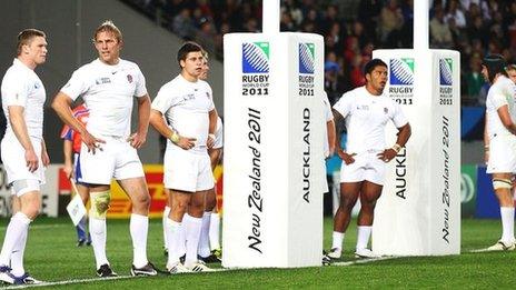 England players look disconsolate after conceding a try in their World Cup quarter-final defeat by France