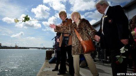 Flowers being thrown into water at Southampton Titanic service