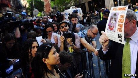 NYPD spokesman Paul Browne holds up a photo of Etan Patz 19 April 2012