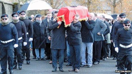 Colum Eastwood carries coffin