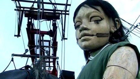 Giant puppet of girl