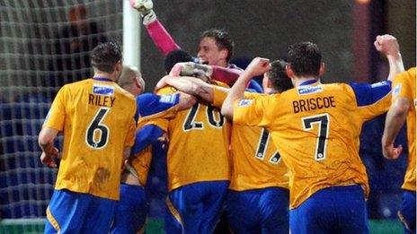 Alan Marriott celebrates his goal