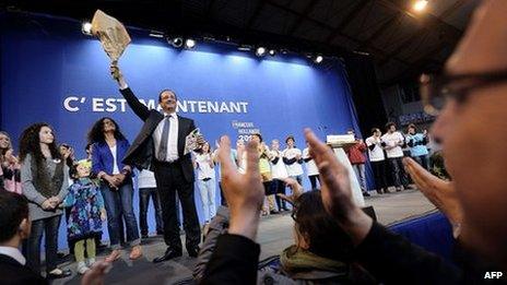 Francois Hollande celebrates his victory in the first round of the French presidential election