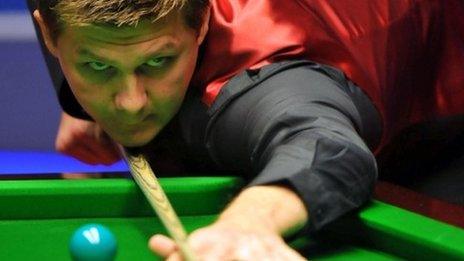 Ryan Day plays a shot in his win over Ding Junhui