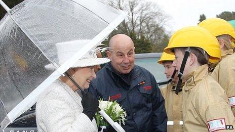 The Queen meets members of the Young Dragons at Cyfarthfa High School and Cyfarthfa Castle Museum in Merthyr Tydfil