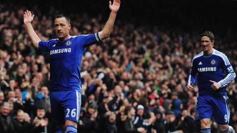 John Terry (left) celebrates scoring for Chelsea