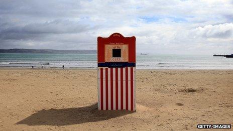 A Punch and Judy traditional puppet show theatre is set up on the seafront of Weymouth Bay, which will be the venue for the London 2012 Olympic and Paralympic Sailing competitions on April 18, 2012 in Weymouth, England