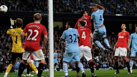 Vincent Kompany heads Man City into the lead