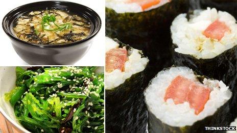 Sushi rolls, miso soup and seaweed salad