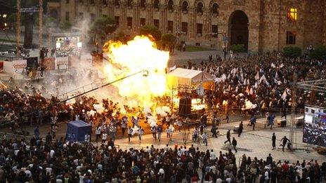 A view shows the explosion of gas-filled balloons during a campaign rally in the central Republic Square in Yerevan, May 4, 2012.