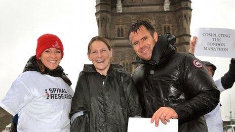 Claire Lomas (middle) with Gabby and Kenny Logan on Tower Bridge, London