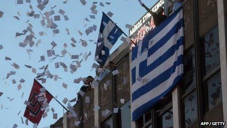 Members of Neo-Nazi party Golden Dawn celebrate after the elections