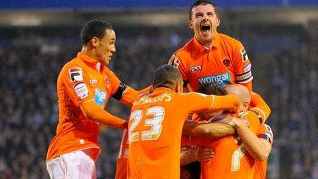 Blackpool players celebrate their second goal