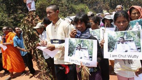 People march to the site where Cambodian anti-logging activist Chut Wutty was killed