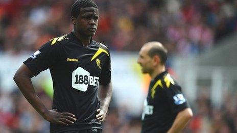 Dedryck Boyata (left) and Martin Petrov of Bolton Wanderers look dejected