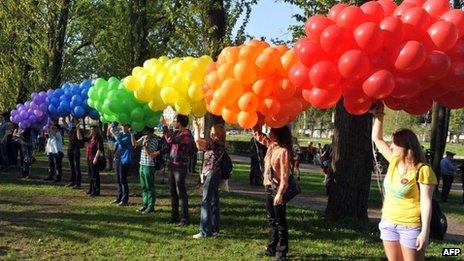 Gay activists with balloons in St Petersburg, Florida 17 May 2012