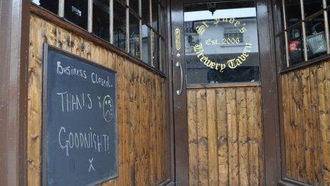 St Jude's pub in Ipswich displays a 'business closed' sign