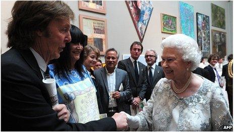 The Queen meeting Sir Paul McCartney