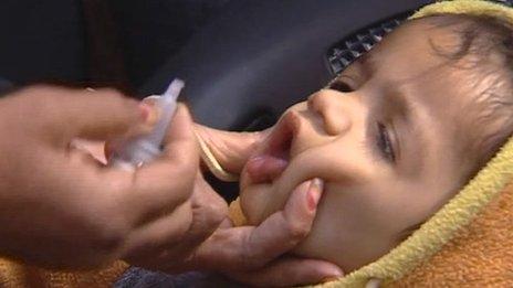 Indian child being given polio vaccination