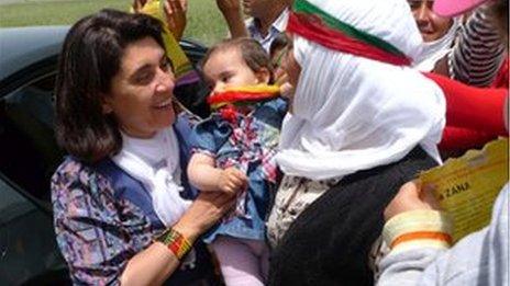 Leyla Zana (head uncovered) meets supporters