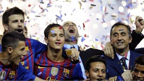 Pep Guardiola celebrates after his final game in charge of Barcelona.