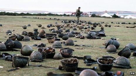 Helmets, weapon magazines and ammunition litter the ground at Goose Green where over 1,200 Argentinian soldiers surrendered to British forces and laid down their arms.