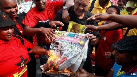 Copies of South Africa's City Press paper on fire