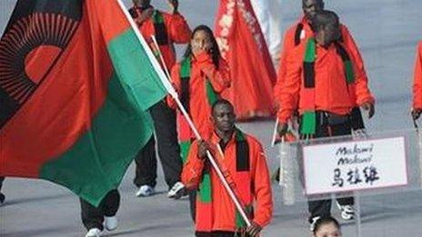 Athlete Charlton Nyirenda (C) Malawi's flag bearer parades in front of his delegation during the 2008 Beijing Olympic Games opening ceremony on August 8, 2008 at the National Stadium in Beijing.