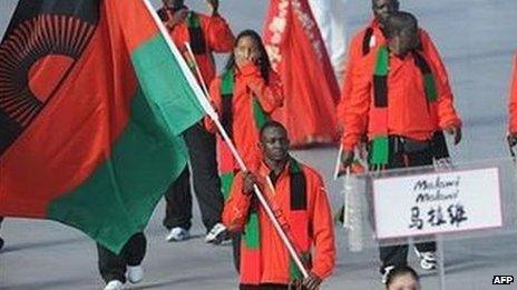 Athlete Charlton Nyirenda (C) Malawi's flag bearer parades in front of his delegation during the 2008 Beijing Olympic Games opening ceremony on August 8, 2008 at the National Stadium in Beijing.