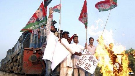 Protesters stop a train in Uttar Pradesh on 31 May 2012